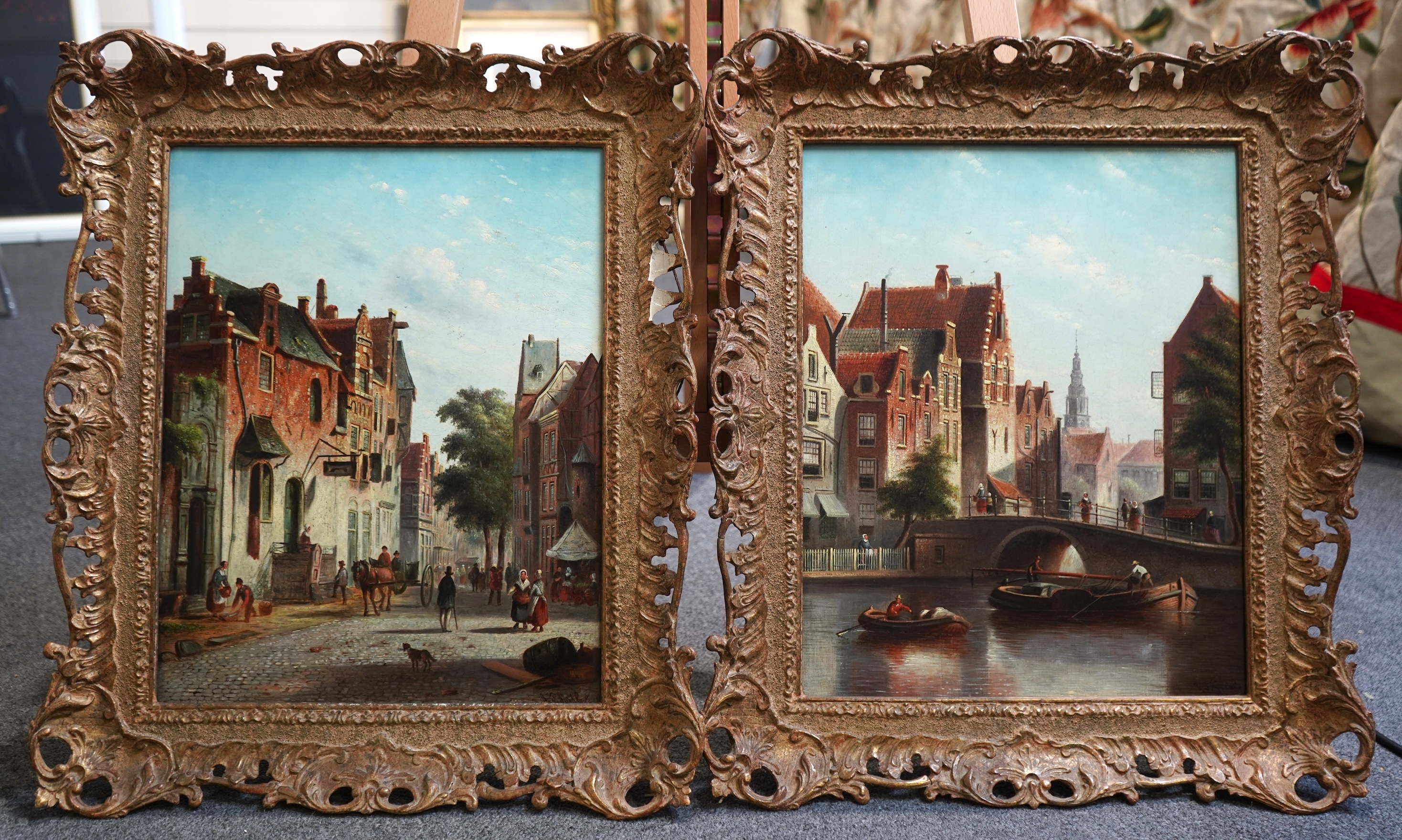 Johannes Franciscus Spohler, Dutch 1853-1894, A pair of Dutch town scenes